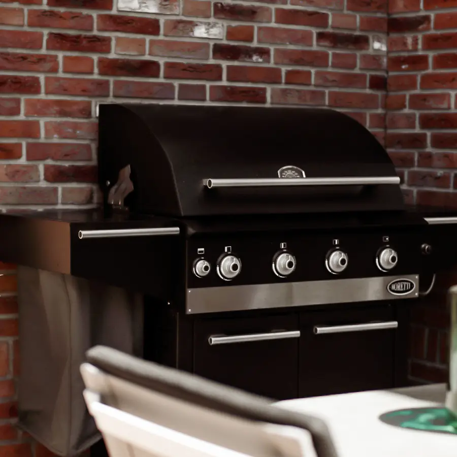 Moderne stadstuin met overdekte lounge en mediterrane beplanting